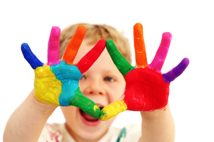 Happy child with painted hands Happy child with painted hands